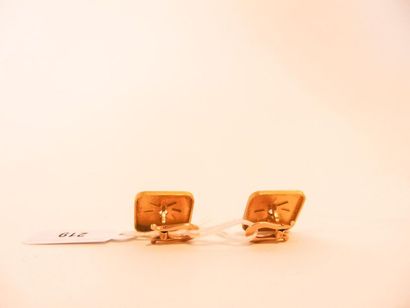 Pair of 18 karat yellow gold cufflinks with...