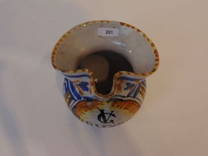A small pitcher with polychrome decoration...
