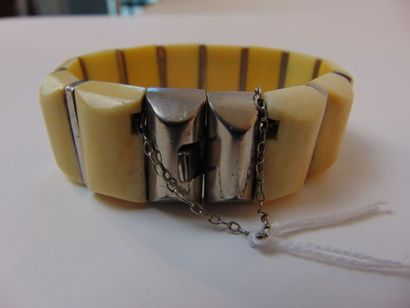 Bracelet articulé en ivoire et argent, d....
