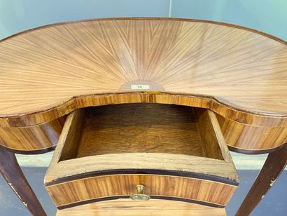 Transitional style kidney-shaped coffee table...