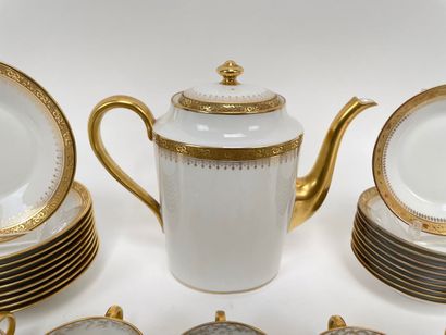LIMOGES
Part of a white and gold tea set,...