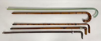 Lot of five antique canes, one of which is...