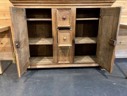 Piece of furniture with two doors and two...
