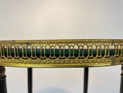 A round sofa with a mirror back, 20th century,...