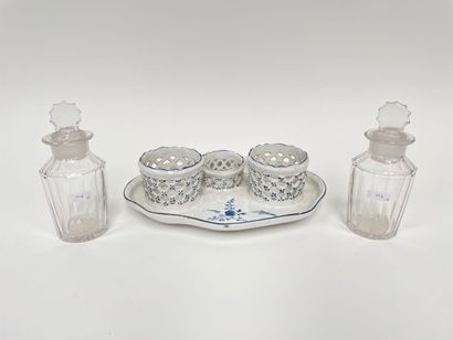 An oval oil cruet with a twig decoration...