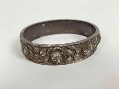 Lot of four costume jewelry (three bracelets...