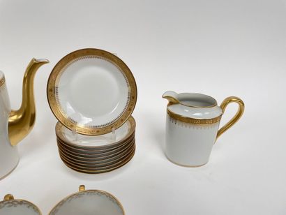 LIMOGES
Part of a white and gold tea set,...