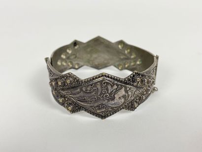 Lot of four costume jewelry (three bracelets...