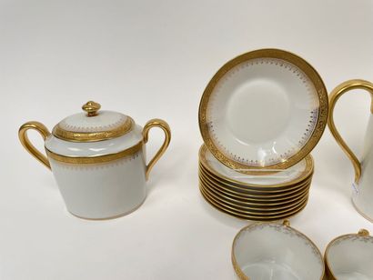 LIMOGES
Part of a white and gold tea set,...