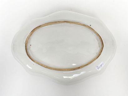An oval oil cruet with a twig decoration...