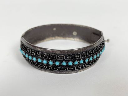 Lot of four costume jewelry (three bracelets...