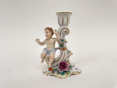 Rocaille torch decorated with a putto in...