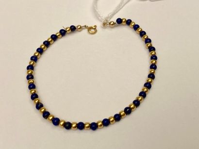 Bracelet en or jaune et lapis-lazuli, l....