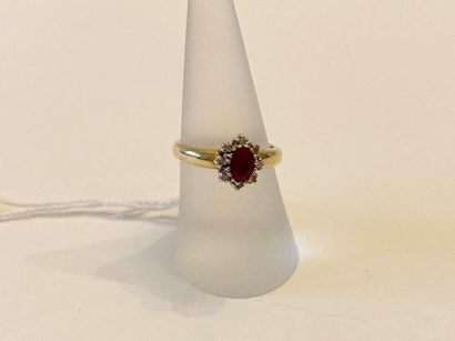 Bague en or jaune (750 millièmes) sertie...