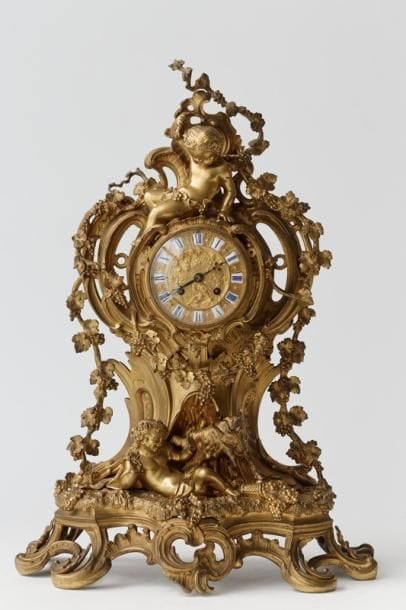 Pendule de style Louis XV aux putti vendangeurs,...