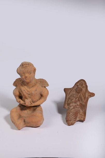Figure d’Eros juvénile ailé.

Figuré assis,...