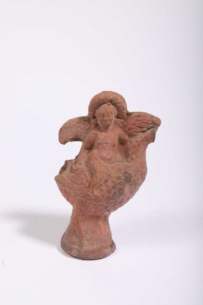 Figurine d’Eros enfant/Harpocrate ailé.

Il...