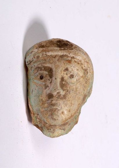 Visage masculin

Faïence, traces de glaçure...