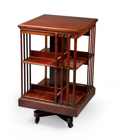 Petite bibliothèque tournante en acajou.

Piètement...
