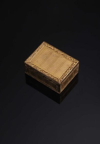 Minaudière en pomponne ciselé et guilloché

France,...