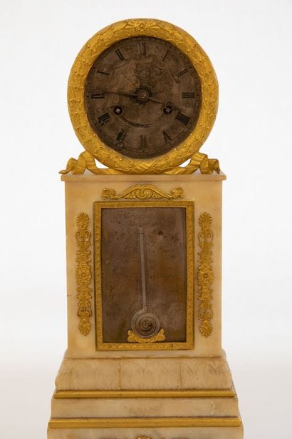 Pendule de cheminée à sonnerie au passage...