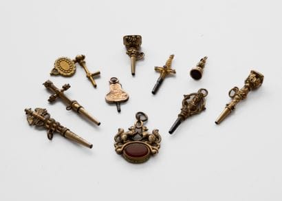 Ten metal keys (stone set, crank, seal dated...