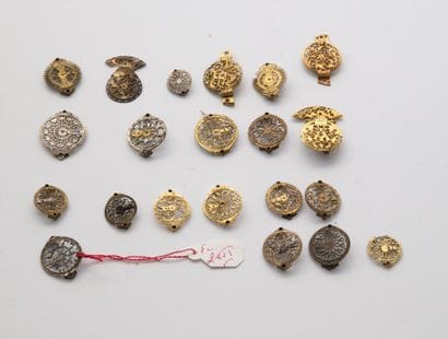 Twenty medium sized watch cocks, two of which...