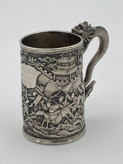 Small silver mug, decorated with battle scenes...