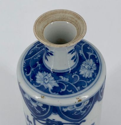 
White porcelain scroll vase with blue underglaze...