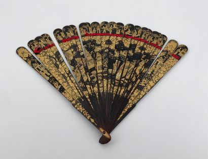 Gold lacquered wood fan, decorated with scenes...