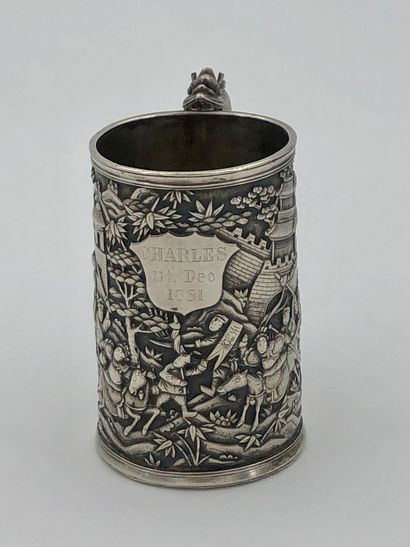 Small silver mug, decorated with battle scenes...