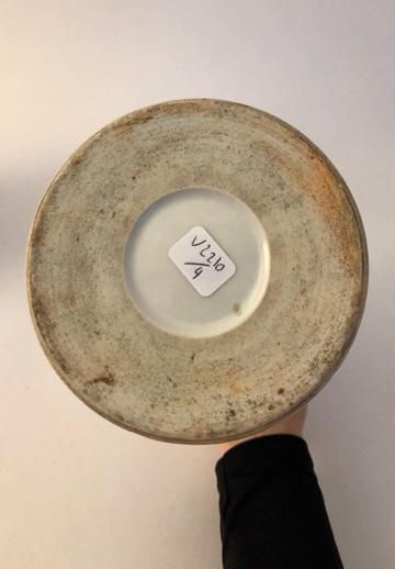 Two cylindrical vases, in porcelain and enamels,...