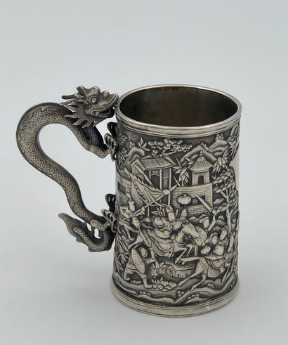 Small silver mug, decorated with battle scenes...