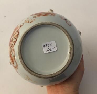 Pair of coral enameled porcelain covered...