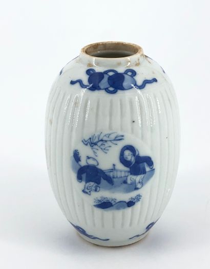 Small ovoid vase in blue-white porcelain...