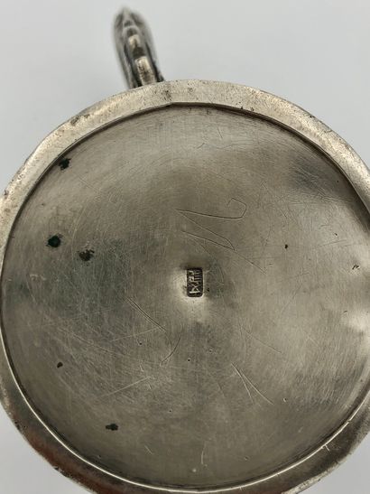 Small silver mug, decorated with battle scenes...