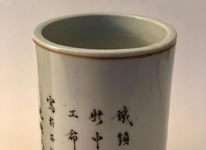 Two cylindrical vases, in porcelain and enamels,...