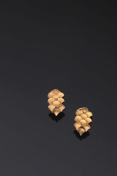 M. Buccellati. Années 1960. 

Parure en or...