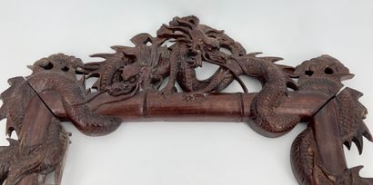 Wooden frame, with carved decoration of dragons...