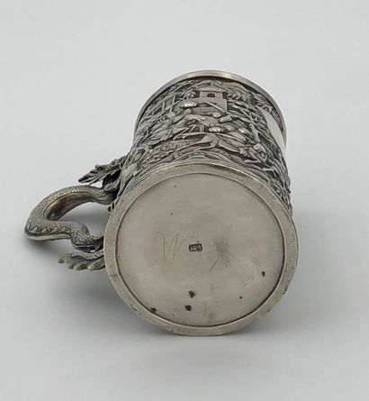 Small silver mug, decorated with battle scenes...