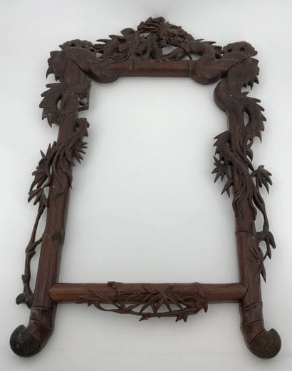 Wooden frame, with carved decoration of dragons...