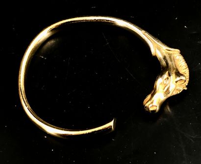 HERMES Paris 
Bracelet jonc en métal doré...