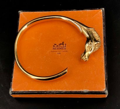 HERMES Paris 
Bracelet jonc en métal doré...