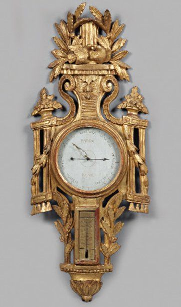 Baromètre thermomètre en bois sculpté redoré...