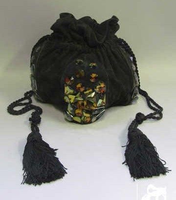 Danièl SWAROVSKI
SAC bourse en daim noir...