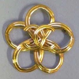 CHANEL
BROCHE 'fleur' en métal doré rehaussée...