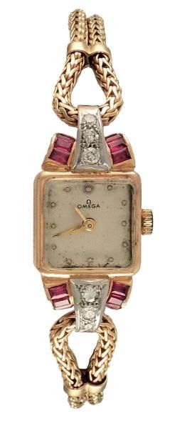 OMEGA
En or, platine et rubis, pb 21.50gr,...