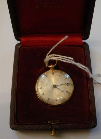 Montre de col en or signée 