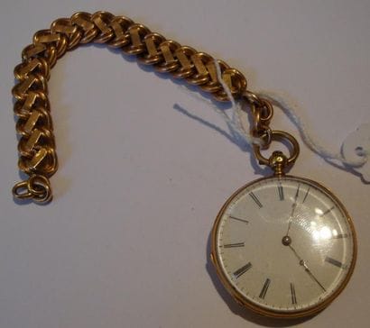 Petite montre à cylindre en or avec sa chaîne...