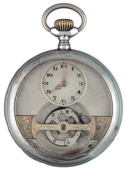 Montre à carrousel en argent signée 